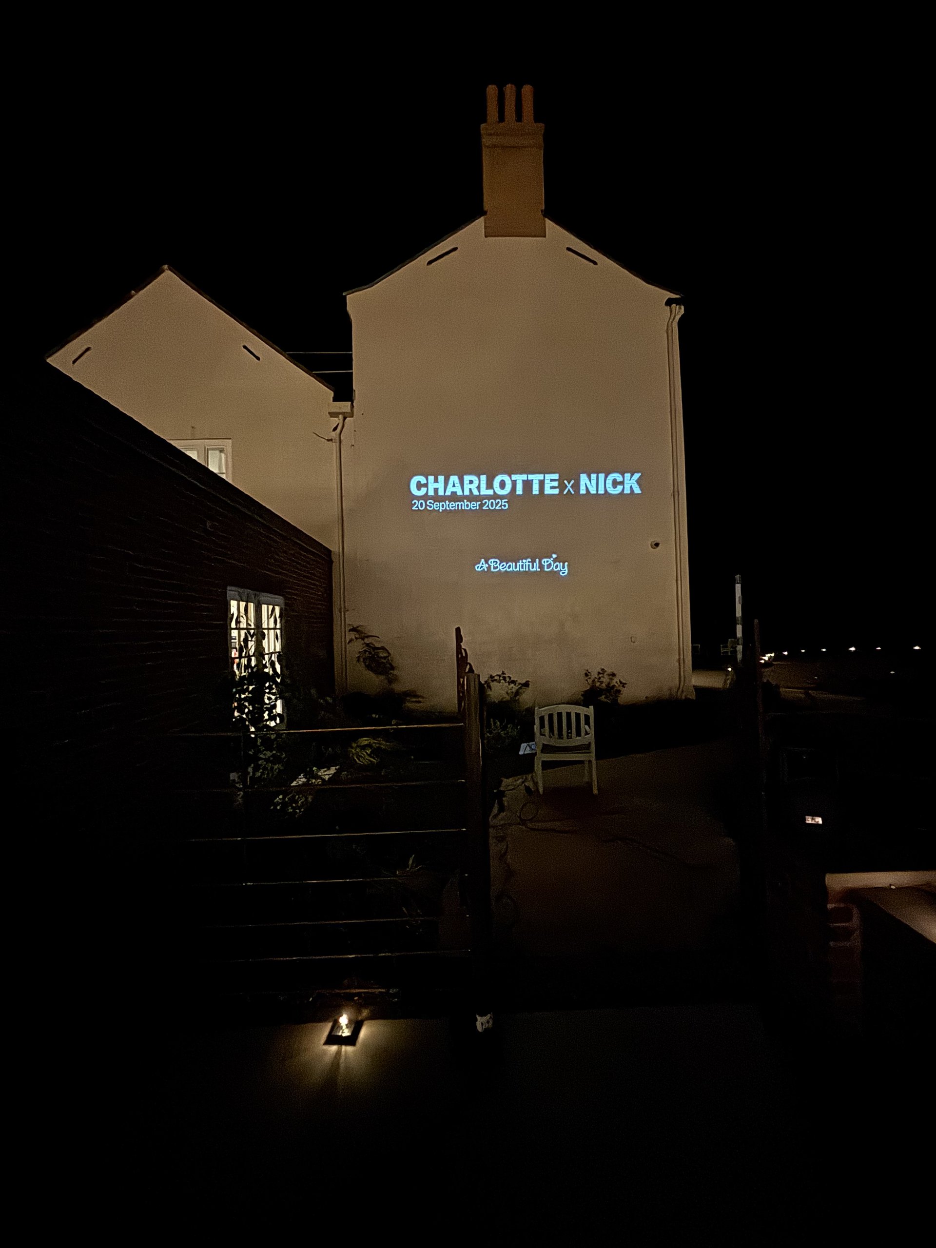 Wedding film projected on English venue wall
